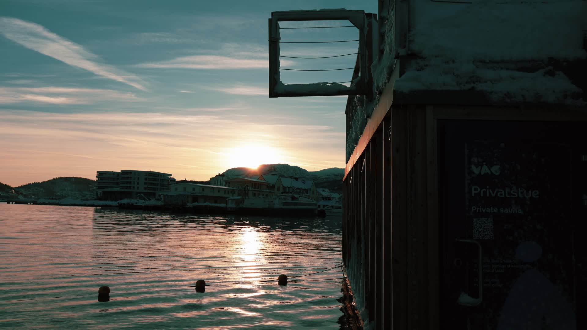 Solnedgang over Harstad sett fra badstuen